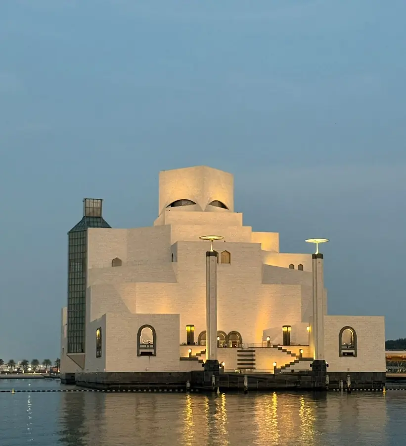 The Museum of Islamic Art standing over the bay at dusk